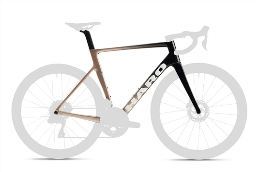 A luxury Rennrad, the Rivette Carbon Frameset by Haro Bikes, boasts an aerodynamic design with a sleek black and gold two-tone color scheme. Its hochwertiges Carbon frame features drop handlebars and disc brakes, all showcased on a white background.