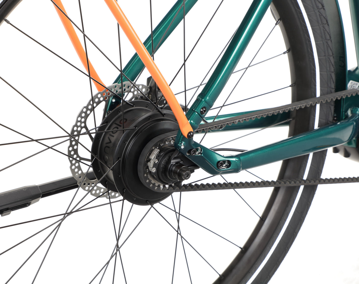 Close-up of Haro Bikes Escondido 1s rear wheel with disc brake, Gates belt drive, and rear hub on green/orange frame.