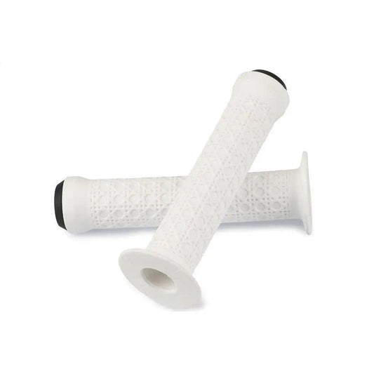Two white Haro Bikes Octagon Griffe handlebar grips with a textured surface, crossed over one another on a white background.
