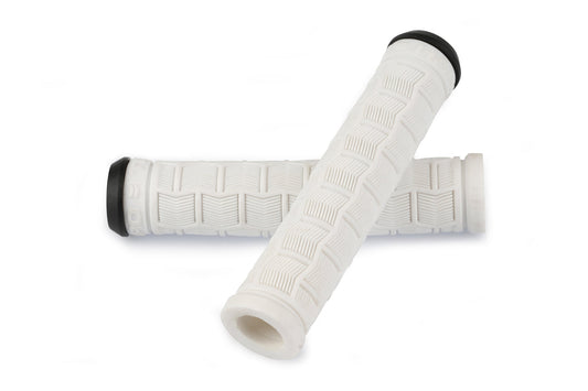 Two Haro Bikes Team Griffe Flangeless white 150mm handlebar grips with textured patterns and black end caps crossed on a plain background.