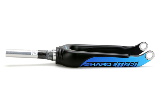 Close-up of a black and blue BMX bike fork, labeled Cliq Citizen Carbon Gabel Blue from Haro Bikes, featuring a C730 Carbon-Blend-Gabelkrone with a sleek and aerodynamic design, lying horizontally against a white background.