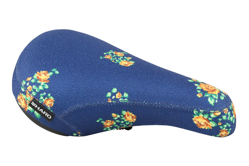 Garski Stealth Sattel from Haro Bikes: Blue seat with floral pattern featuring yellow roses and green leaves, brand on the side.