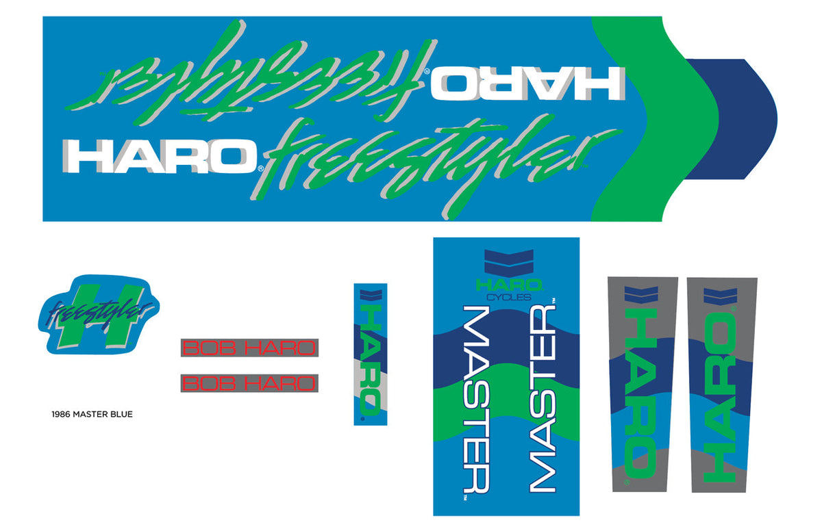 A collection of 1986 Decals Master Blue/Green vintage-bike frame decals featuring various logo designs in blue, green, and grey.