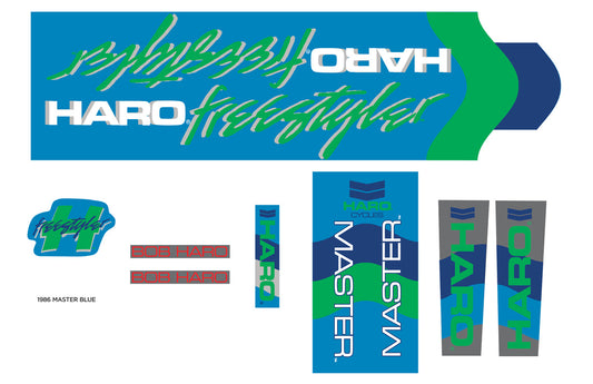 A collection of 1986 Decals Master Blue/Green vintage-bike frame decals featuring various logo designs in blue, green, and grey.