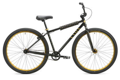 The Haro Bikes B.M.F is a black BMX bike with yellow accents, 26-inch wheels, padded top tube, ideal for ride-outs, and has a single-speed drivetrain.