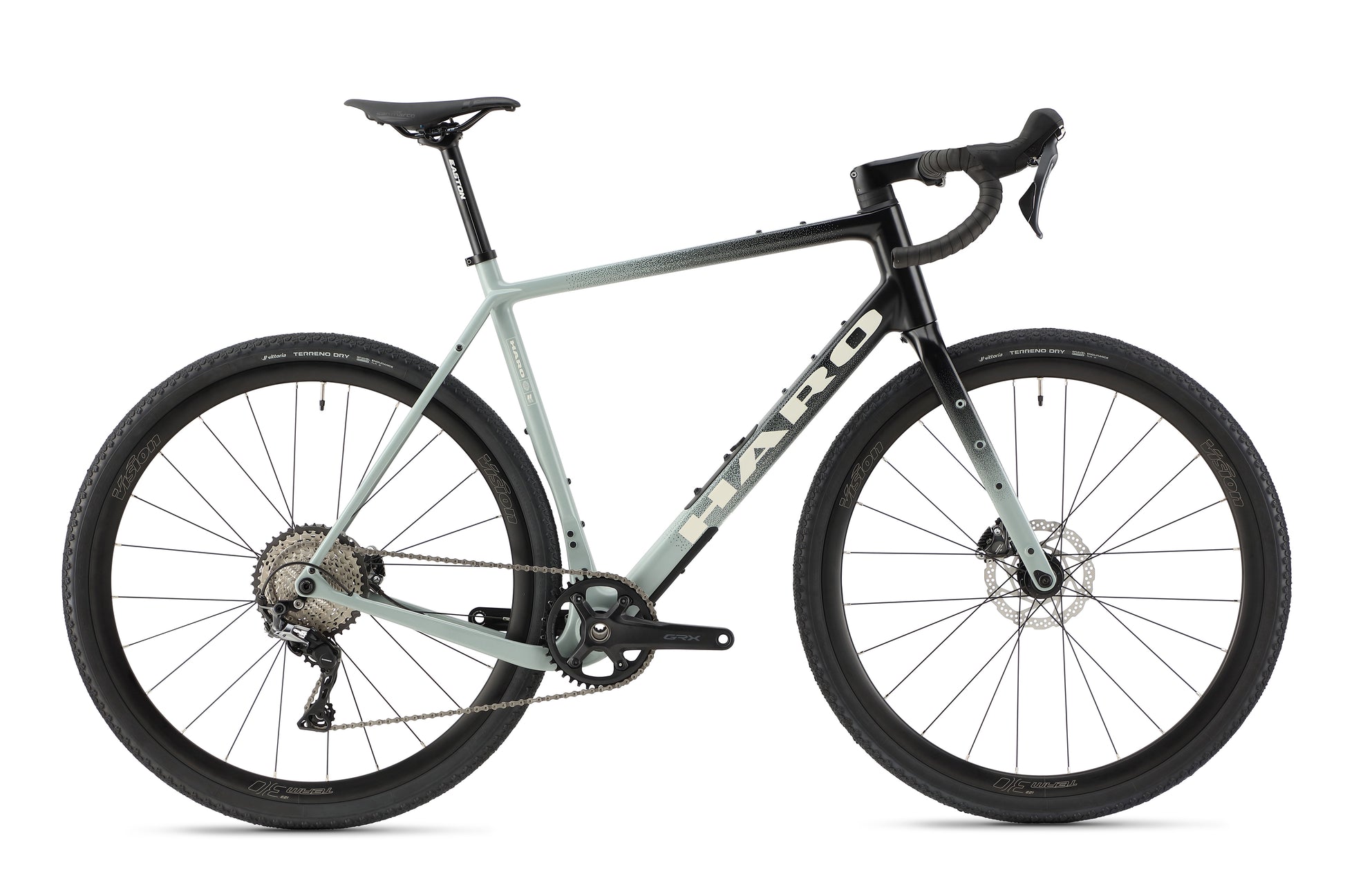 Introducing Haro Bikes Buzzard Carbon 3, a sleek, modern gravel bike featuring a light gray frame with black handlebars. Outfitted with Shimano GRX Gruppe disc brakes and robust tires, its ideal for off-road Gravel-Abenteuer. The brand name is prominently displayed on the frame.