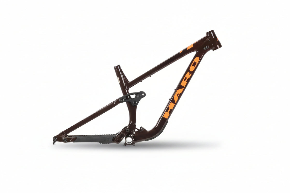 A Cedar Brown/Orange Haro Bikes Greer Alloy Frameset with mullet-setup is displayed on a white background.