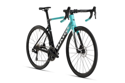 The Rivette Carbon 2 by Haro Bikes is a race-ready road bike in turquoise and black, featuring drop handlebars, disc brakes, and internal cable routing. Its sleek frame boasts a high-pitch carbon fiber aerodynamic design with the brands logo prominently displayed.