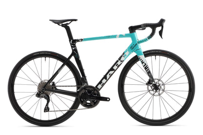 The Rivette Carbon 2 by Haro Bikes is a sleek, race-ready road bike featuring a turquoise and black frame with internal cable routing, drop handlebars, thin tires, and disc brakes. The brand logo stands out on the frame against a plain white background.