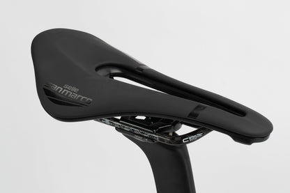 A sleek black Selle San Marco bicycle saddle with a modern cut-out design is mounted on a seat post against a white background. Perfect for the Haro Bikes Rivette Carbon LTD, this model could be part of a limitierte Auflage.