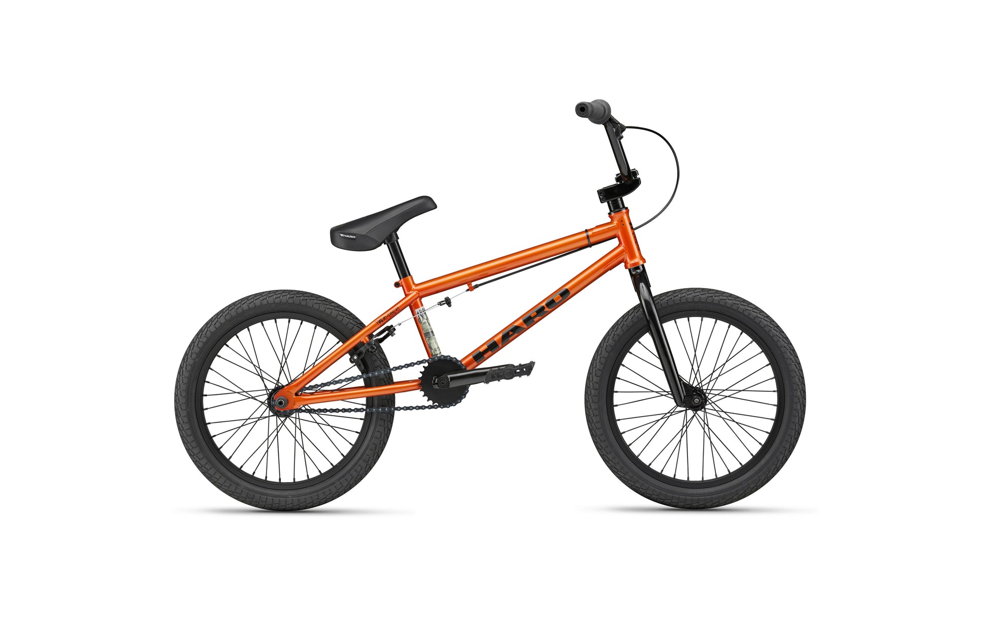 A Haro Bikes Downtown 18 in Gloss Copper Orange with black tires, seat, and handlebars is shown on a white background.