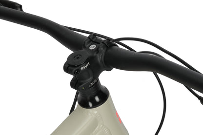 Close-up of the Double Peak 2s handlebars and stem, showing Haro Bikes branding on the frame with securing bolts.