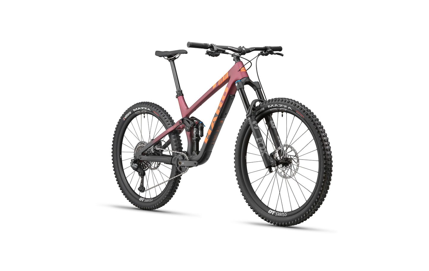 The Haro Bikes Daley Carbon 1 is a modern full-suspension All-Mountain bike with thick tires and a matte maroon and black frame.