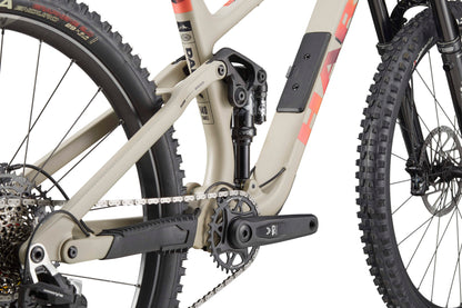 Close-up of the Haro Bikes Daley Carbon 3 frame showing rear suspension, drivetrain, and parts of both wheels.