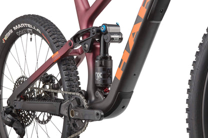 Close-up of Haro Bikes’ Greer Carbon 1 frame, Fox rear suspension, and drivetrain in detailed focus.