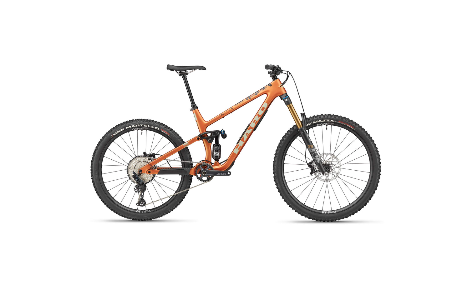 The Haro Bikes Greer Carbon 2 is a full-suspension orange enduro bike with black tires, disc brakes, and Shimano SLX.