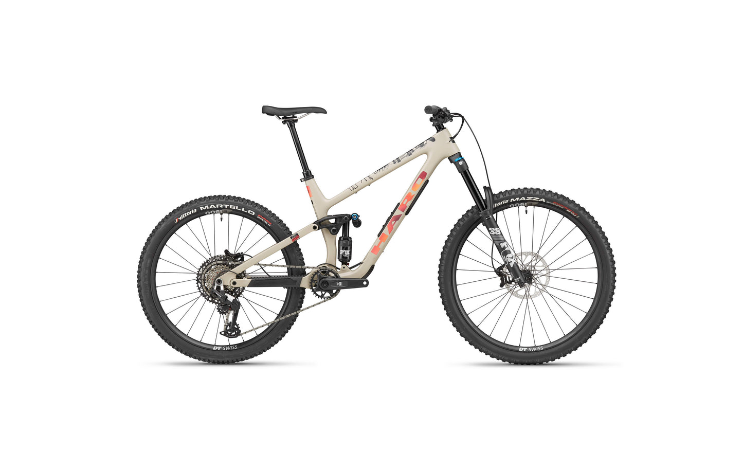 The Haro Bikes Greer Carbon 3 is a beige endurobike with black-orange accents, knobby tires, and disc brakes for trail agility.