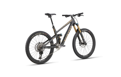 The Haro Bikes Daley Carbon Top Shelf features a black/bronze carbon frame, wide tires, and disc brakes, shown on white.
