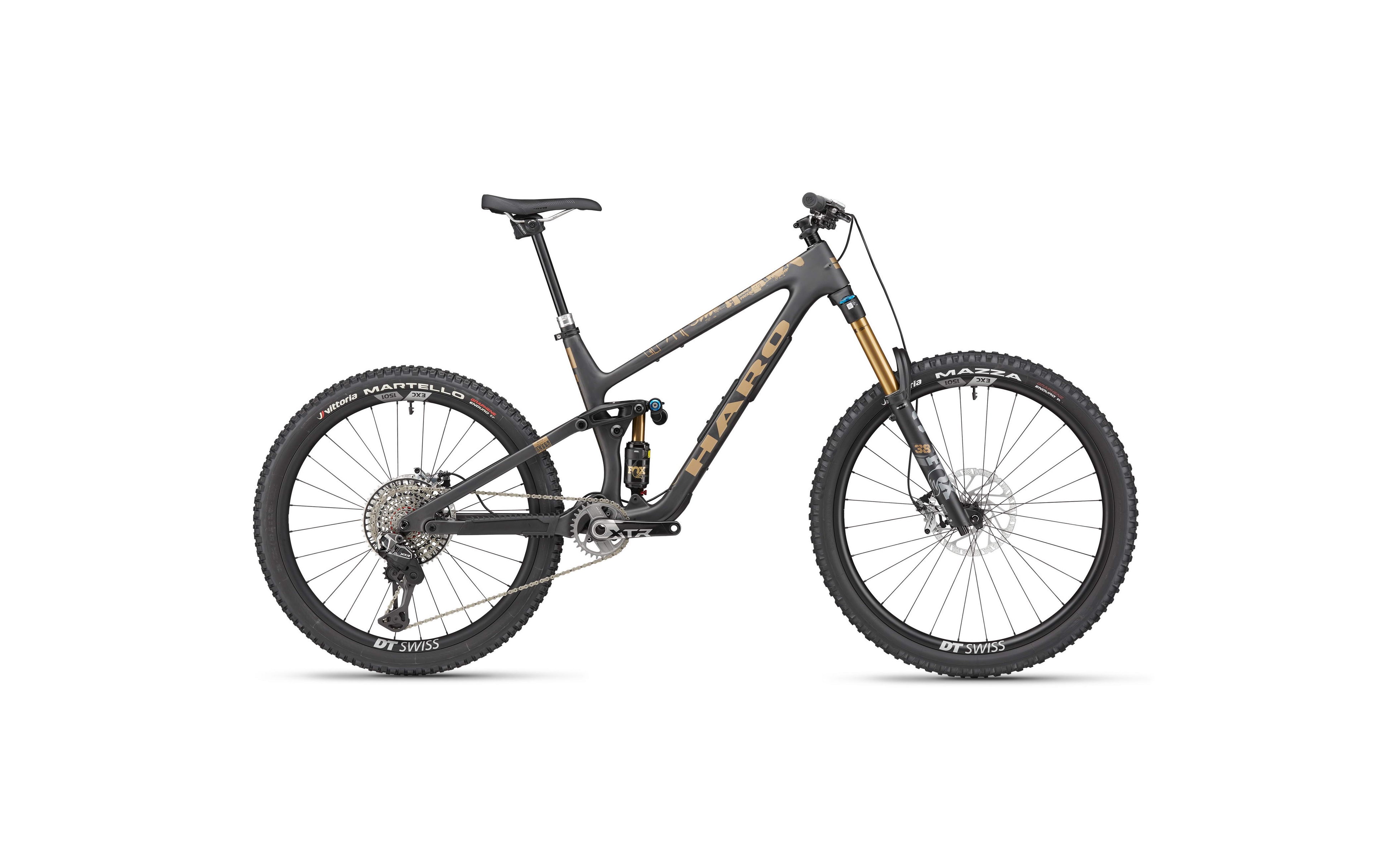 The Haro Bikes Greer Carbon Top Shelf mountain bike features thick tires, disc brakes, and a carbon frame on a white background.