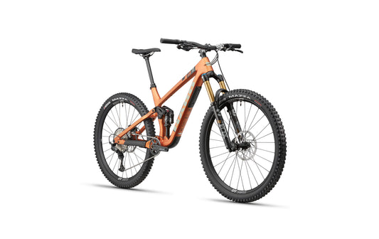 The Haro Bikes Daley Carbon 2 is shown at a three-quarter angle with thick tires, disc brakes, Shimano SLX, and Fox suspension.