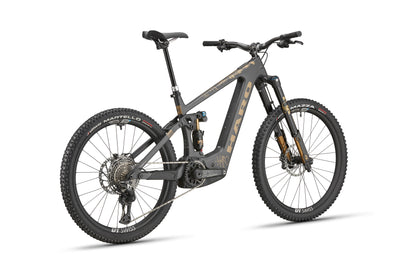 A gray Haro Bikes eGreer Carbon Top Shelf E-Bike with disc brakes and wide tires, shown from a front-side angle.