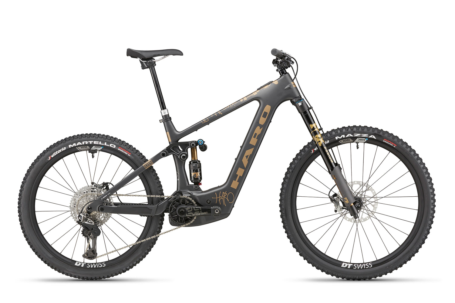 A side view of the Haro Bikes eGreer Carbon Top Shelf E-Bike in black and gold with thick tires, full suspension, and disc brakes.