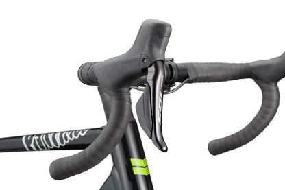 Close-up of HARO Partimos Alloy road bike's handlebars and Shimano 105 Di2 lever with wrapped grips, on white background.