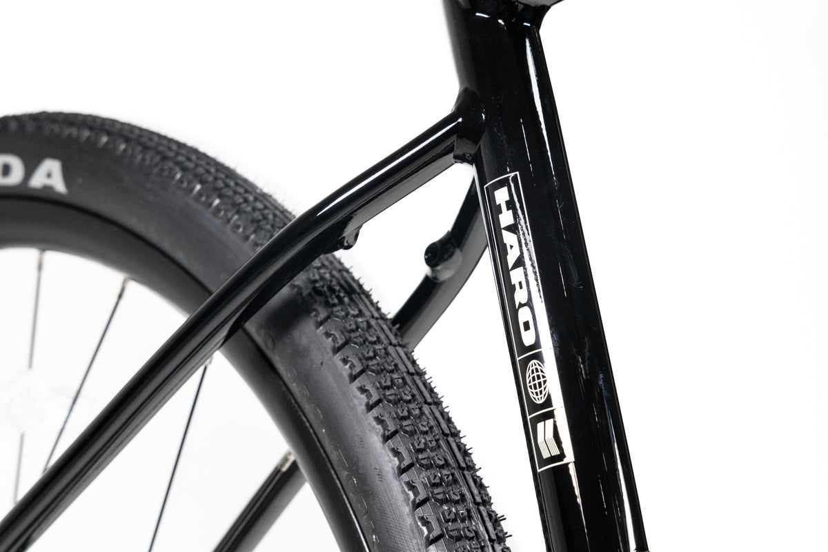 Close-up of a Haro Buzzard Alloy LTD 2 bicycle frame showing the seat tube and rear tire.