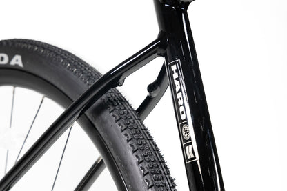 Close-up of a Haro Buzzard Alloy LTD 2 bicycle frame showing the seat tube and rear tire.