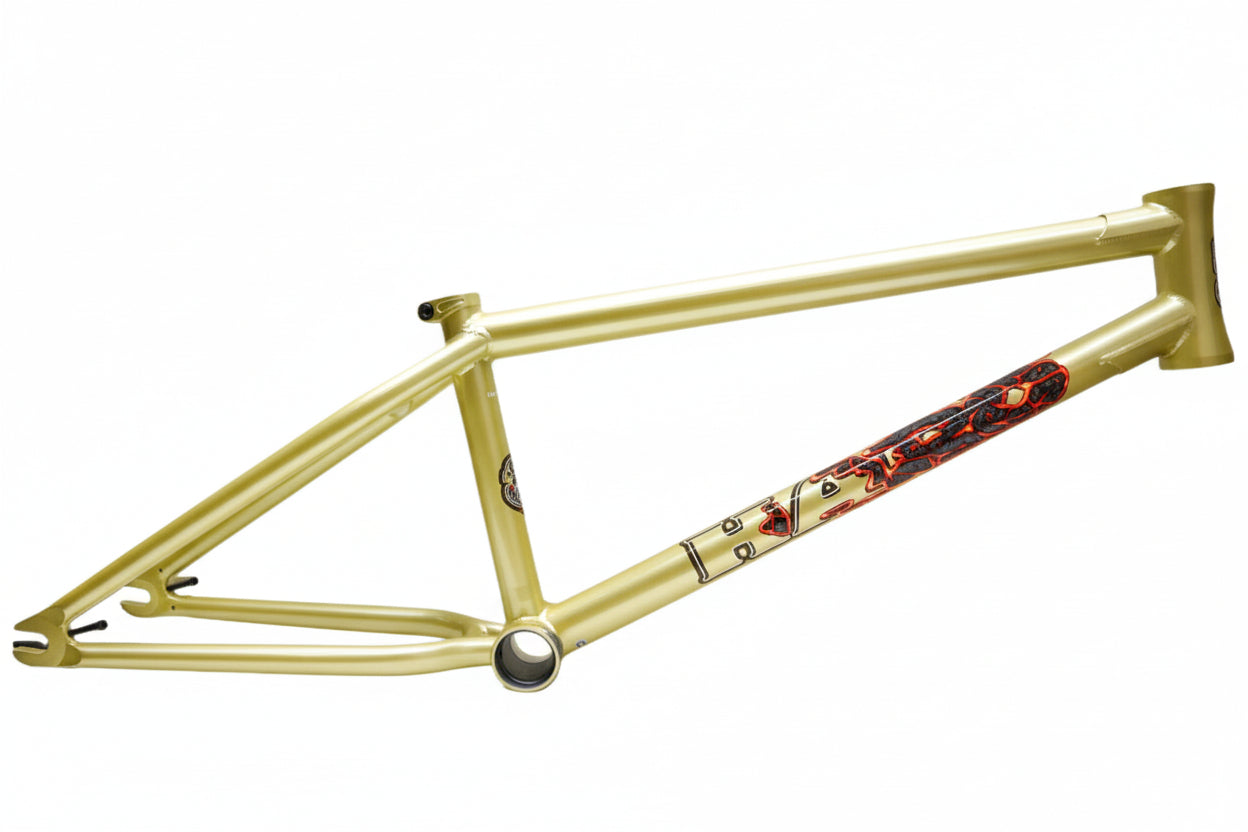 The Haro Bikes "Chad Kerley" CK V3 gold BMX frame features red/black graphics, capturing street culture style on white backdrop.