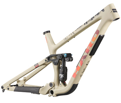 The Greer Carbon Frameset by Haro Bikes is matte tan, full-suspension, with rear shock and progressive geometry for agile rides.