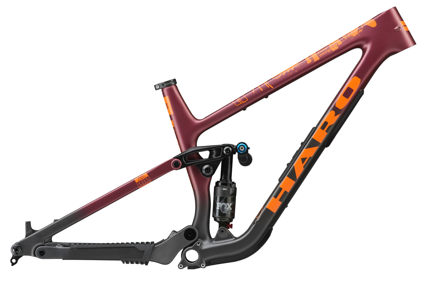 The Greer Carbon Frameset by Haro Bikes features a maroon/black finish, bold orange branding, and progressive trail geometry.