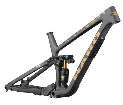 The Haro Bikes Greer Carbon Frameset in matte black and gold, side view, highlights its progressive geometry and rear shock absorber.