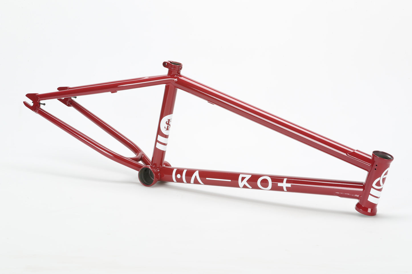 A red Haro Bikes "Dennis Enarson SD" V3 Rahmen with white graphics and integrated headset, shown on its side on a white background.