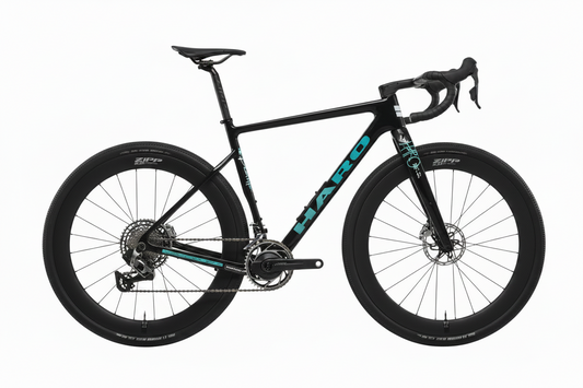 Haro Bikes Buzzard Carbon Frameset “Black Sunrise” road bike with blue accents, drop bars, and deep wheels on a white background.