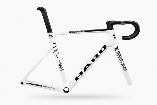 Haro Bikes Partimos Carbon Frameset “Black Sheep” with black handlebars, seatpost, logo, and unique Design graphics on frame and fork.