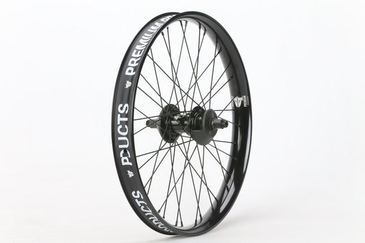 A black Curb Cutter Freecoaster Rear Wheel by Premium, showcasing PREMIUM PRODUCTS text in white on the rim, is displayed against a plain white background.