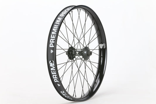 A black Curb Cutter Front Wheel by Premium, featuring thin spokes and PREMIUM plus ROOKS branding, is set against a white background. The sleek design highlights its refined curves perfectly.