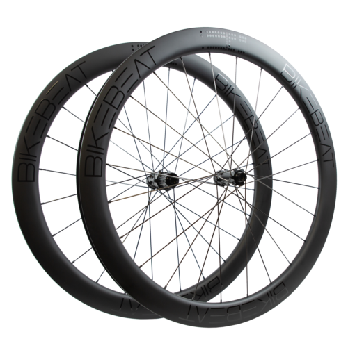 Bike Beat Überflieger Pro 50 Disc wheelset featuring black deep-section carbon aero rims with thin spokes.