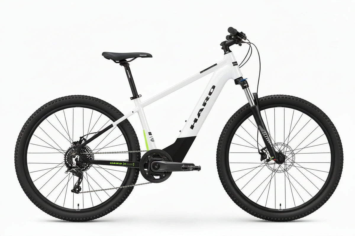 A Haro Bikes eKids I/O 24/26 mitwachsendes E-Bike for youths, white with black wheels and seat, shown side-on against a plain background.