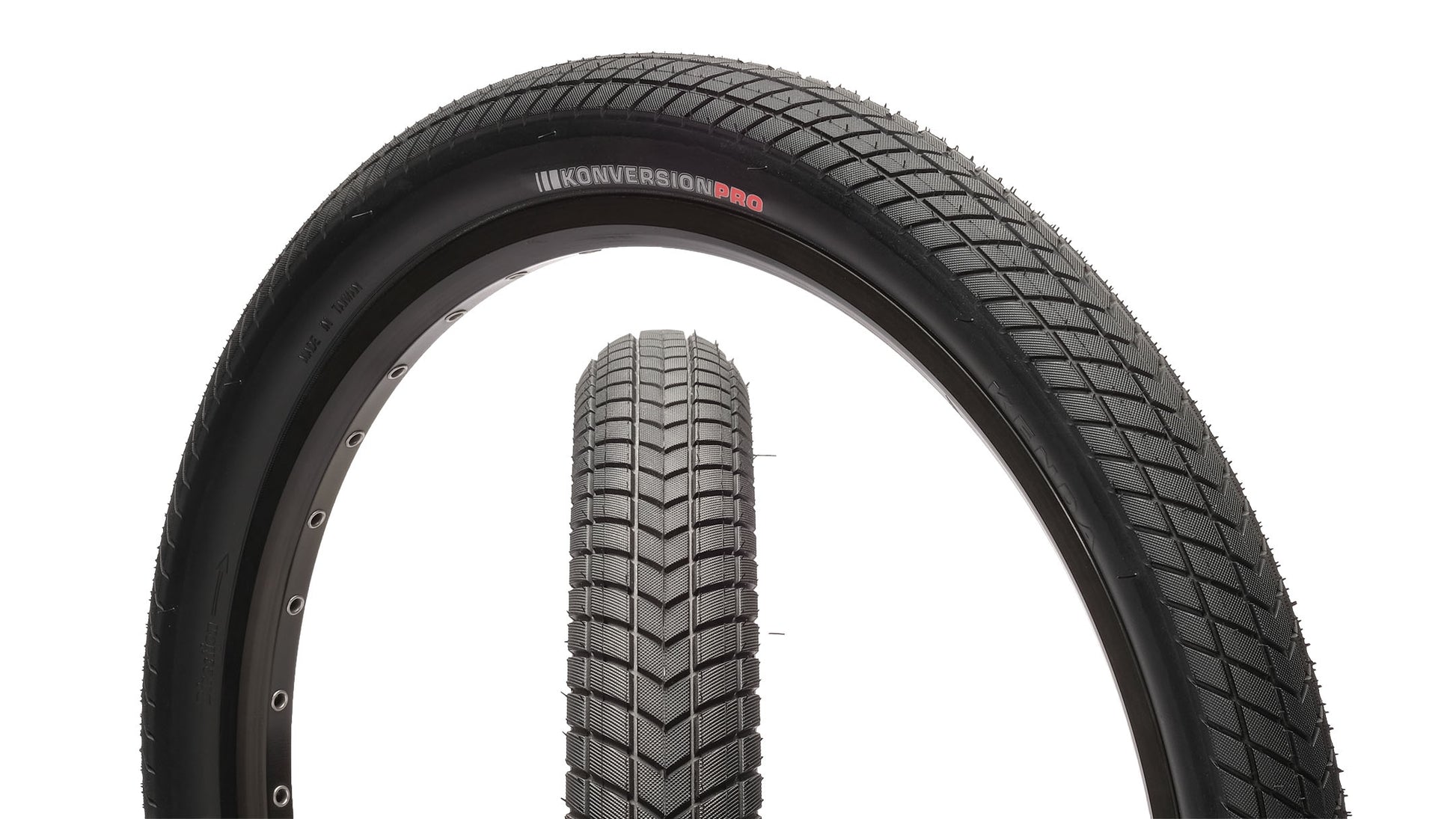 Two Kenda Konversion Race Reifen tires, by KENDA, with textured tread—one vertical and one tilted—on a white background.