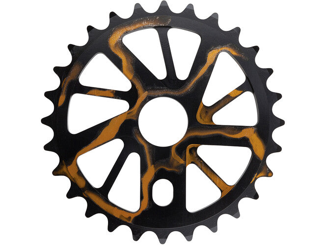 The PREMIUM GNARSTAR KETTENBLATT is a black and copper 24T chainring of CNC-milled 7075-T6 aluminum.