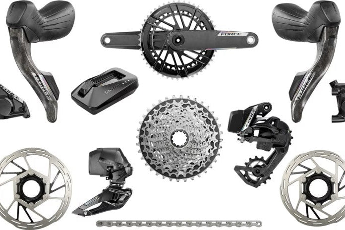 Haro Bikes Transmission Build Kit Road SRAM Force AXS: shifters, crankset, derailleurs, cassette, chain & rotors on white.